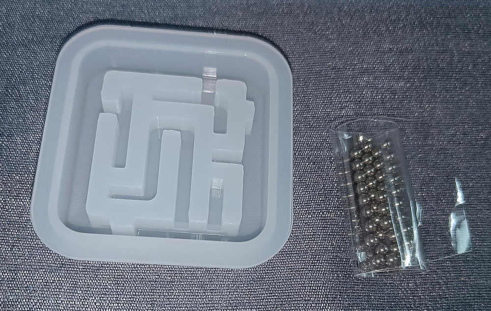 silicone ball game puzzle type mould it comes with steel ball with each mould