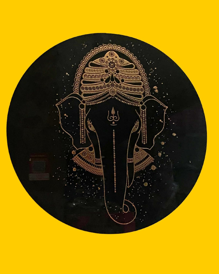 SNOOGG 12-inch UV Reactive Wall Art in black and gold features contemporary Ganesha imagery, perfect for meditation spaces, yoga studios, or hippie-themed bedrooms. (Ganesha-201)