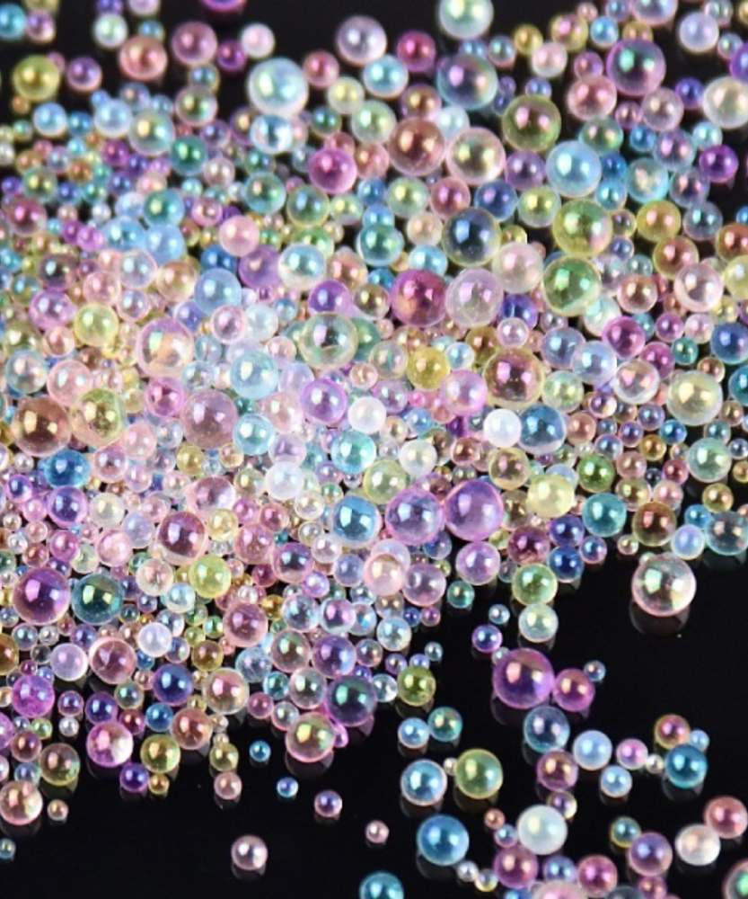 Rainbow crystal glass beads mix in 2 mm and 3 mm . excellent quality for rich art work. Pack of 20 gram