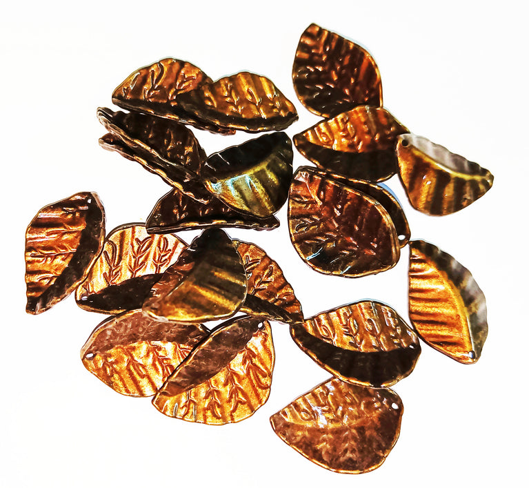 30 Copper Color light Weight Leaf Embellishment For Decoration Size Approx 25 mm  . Ditto as shown in photo.